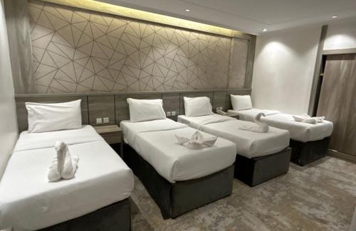 Al Aziziyah Lit Et Petit-Déjeuner | Nukhbat Al Jiwar Hotel Makkah