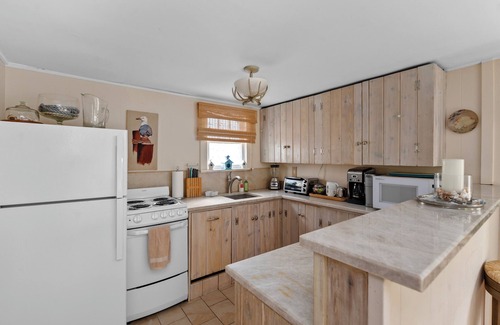 Ocean Beach Maison | Charmant Cottage avec Vue sur la Baie