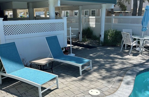 Surf City Maison | Ocean Block, maison de 4 chambres avec piscine, bain à remous et des mesures pour la plage.