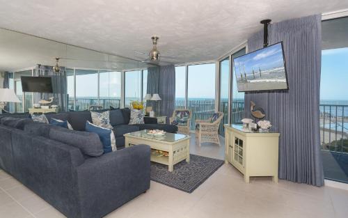 Bethune Beach Appartement | Ocean Condo 104 ~ Ground Floor Corner Condo with wrap around balcony Walk right out to Pool