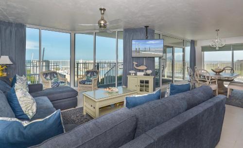 Bethune Beach Appartement | Ocean Condo 104 ~ Ground Floor Corner Condo with wrap around balcony Walk right out to Pool