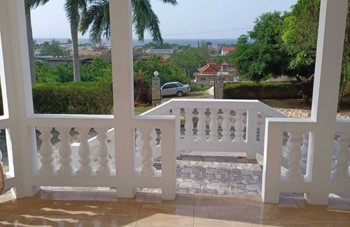 Greenwood Villa | Ocean View 2BR Palm Villa 1st Floor