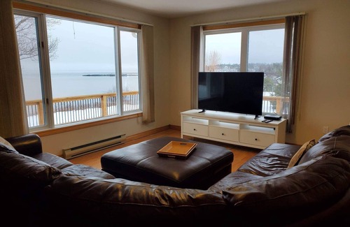 Saint John Maison | Oceanfront Bungalow on the Bay. 3 Bed 2 Bath with a large treed lot.