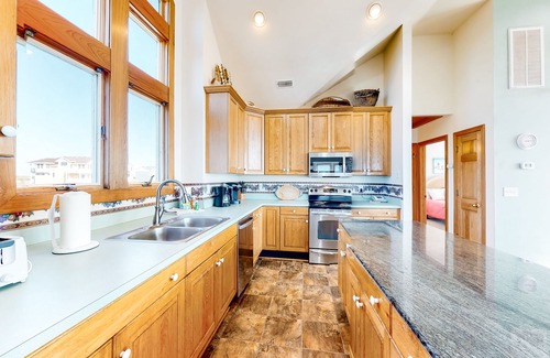 Ocean Isle Estates Maison | Oceanfront home with private hot tub, pool, washer/dryer & central AC