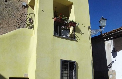 Tessennano Appartement | Vue sur la campagne du village perché sur les collines de la Maremma - Wifi