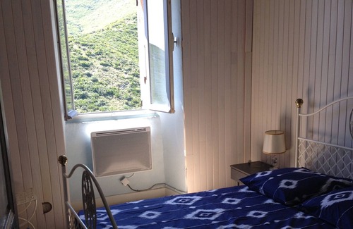 Rogliano Maison | Maison de village ancienne avec grande terrasse dans hameau, cap corse