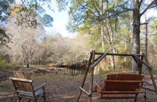 Claxton Maison | On the Riverbend Cabin