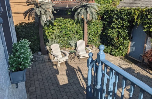 Long Beach Maison | "Once Upon a Tide" eclectic beach house with pizza oven, game room, fireplace