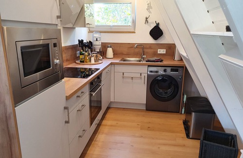 Carolinensiel Maison | Only roof house Murmel 5, charging station f. E-cars, WLAN, beach chair, fireplace