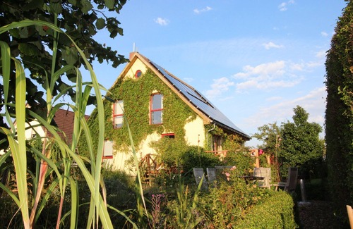 Schwarbe Maison | Maison de vacances biologique, 3 chambres, 3 salles de bains, jardin naturel, sauna, cheminée, WiFi près de la rive nord de Wittow