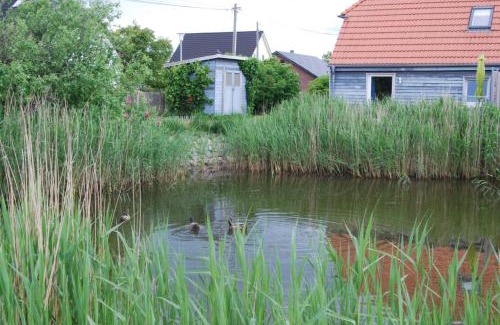 Ribnitz-Damgarten Appartement | Ostseelandhaus mit Südterrasse und Teich OFC 07