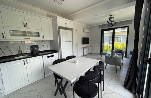 Hisaronu Appartement | Our beautiful suite with mountain views, very close to Ölüdeniz beach