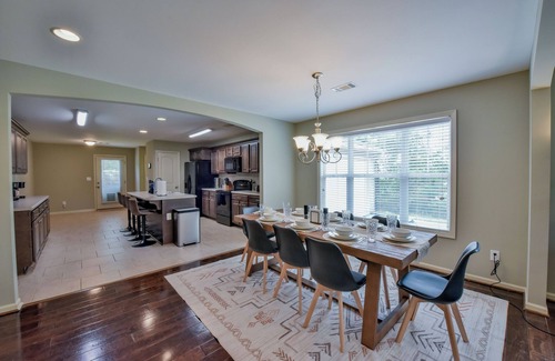 Northport Maison | Overtime Outpost-Book for 2025 football season and more! Fenced in back-yard!