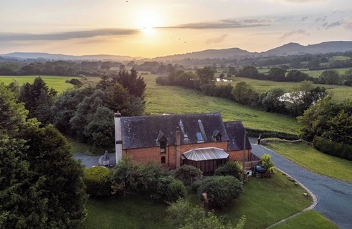 Hyssington Cottage | OWLBURY HALL BARN, pet friendly, with hot tub in Bishop's Castle