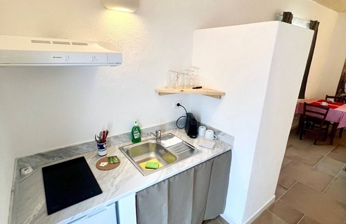 Panza Appartement | "Palm Cottage" with garden, swimming pool and spa hot tub