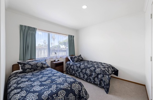 Papamoa Beach Cottage | Palm Tree Haven - Papamoa Maison de vacances