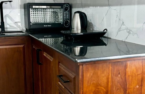 Kochchikade Appartement | Palmwood Cottages Double Bed Room with Kitchen
