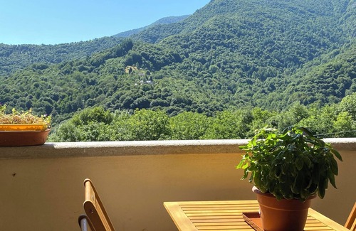 Sanfront Maison | Panoramic two-story dwelling with private garden, surrounded by green woods.
