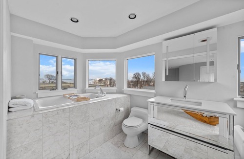 Waveland Maison | Panoramic views, steps to the water, 7 minute walk to private beach.