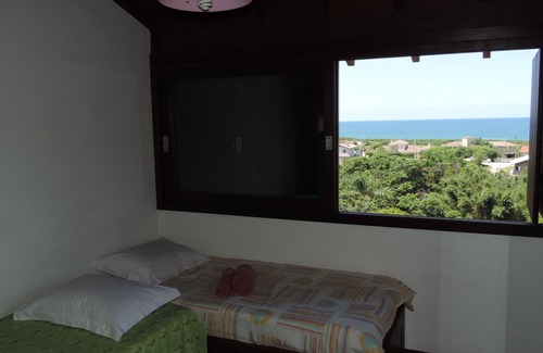 Garopaba Maison | Paradis sur la plage de Silveira. Maison pour 8/10 personnes avec belle vue sur la mer.