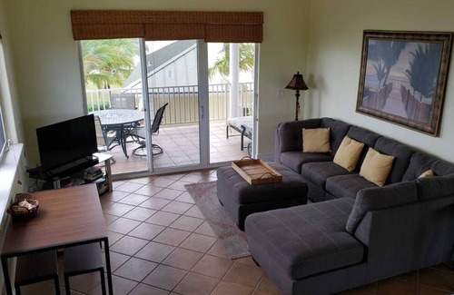 Freeport Maison | Paradise is Due South! One level main house and 2 story complete guest house.