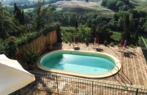 San Giovanni d'Asso Villa | Pasqui Villas La Capanna accogliente casa in paese con vista piscina WiFi