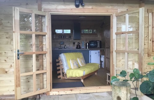 Surlingham Cabine | Peaceful, cosy log cabin, Norfolk Broads village