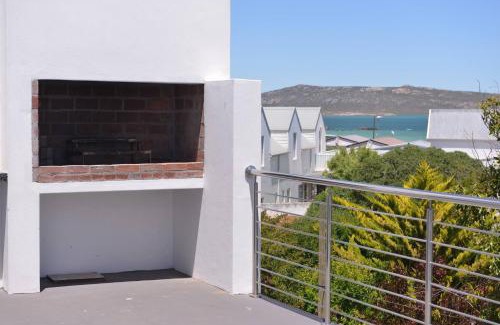 Langebaan Maison | Pelican Cove is a Modern 4-Bedroom Holiday Home in Langebaan with some Sea Views