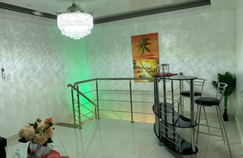 Gregorio Luperon Appartement | Penthouse 15 minutos del centro de la ciudad, aeropuerto, restaurantes y mas.