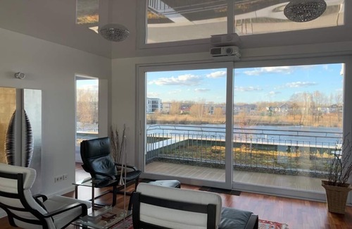 Werder Copropriété | Penthouse dans le style "Houseboot" de la marina de Werder / Havel près de Berlin