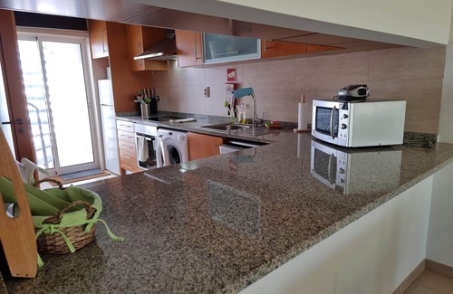 Fuseta Copropriété | Penthouse in Fuseta with private roof terrace and sea views