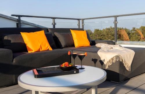 Prora Appartement | Penthouse mit Dachterrasse, Meerblick, Gasgrill, Klimaanlage, Kamin, Luxus-Design-Apartment, 2 Minuten zum Strand