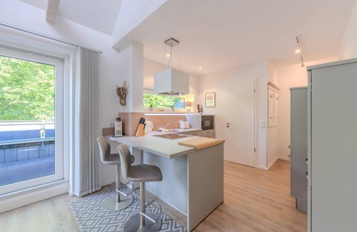 Zentrum Appartement | Penthouse Stine vacation apartment in Husum for up to 3 people