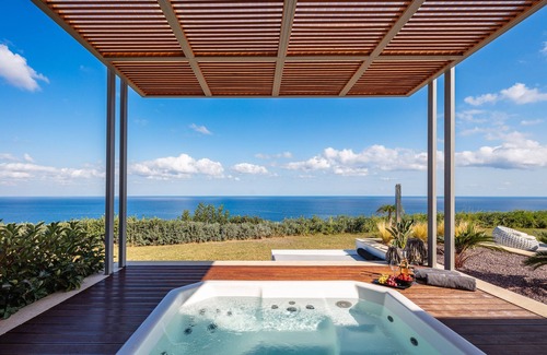 Atsipópoulon Villa | Stylish Villa With Boho Decor, Heated Pool, Lawn Garden, sea Views & Playground!