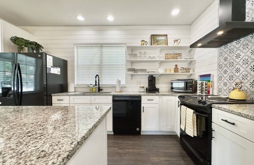 Historic District Maison | Pet Friendly Historic Downtown Bungalow with Fenced In Yard!