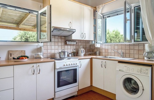 Kefalonia Maison | Maison de vacances Ktima Dilberaki avec jardin, balcons et climatisation.