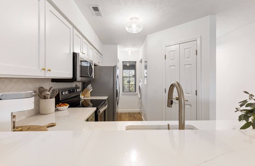 Pawleys Island Copropriété | Petite Palmetto at True Blue. Luxe top floor condo