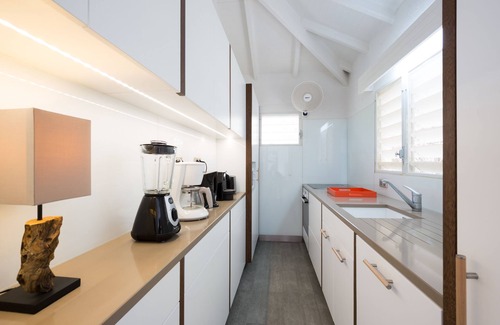 Pointe Milou Villa | Vues majestueuses, emplacement idéal, grande piscine et bassin profond, salons privés