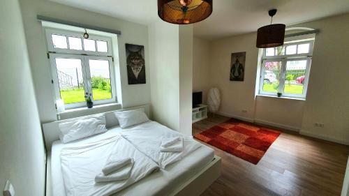 Buhlau/Weier Hirsch Appartement | Pineapple Apartments Dresdner Heide mit Garten
