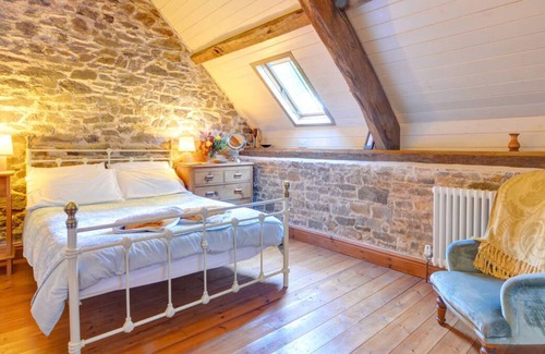 Llanwrda Maison | Conversion de grange du 17ème siècle conservant une grande partie de son caractère original. Espace de vie ouvert avec l