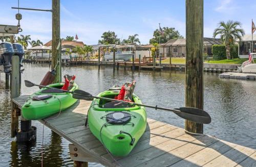 Bal Harbour Maison | Pirates Den a 4BR Pet-Friendly Waterfront Oasis with Pool, Dock, Personal Water Boats, Fire Pit, Game Room and Bar
