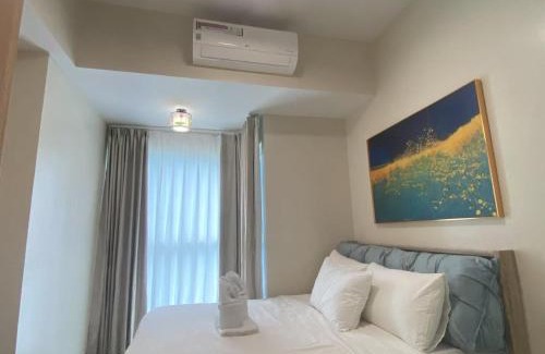 Tambo Appartement | Playful 1BR With Magnificant Bayview Garden View Near Okada Solaire Aiports with Free Parking