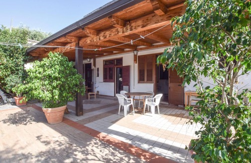 Praia a Mare Appartement | Practical apartment with open terrace and communal pool.