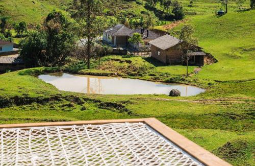 Aguas Mornas Maison | Prana Chalé com Hidromassagem - Águas Mornas - SC