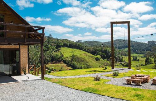 Aguas Mornas Maison | Prana Chalé com Hidromassagem - Águas Mornas - SC