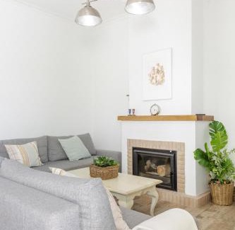 Chipiona Appartement | Precioso apartamento con Chimenea patio solarium