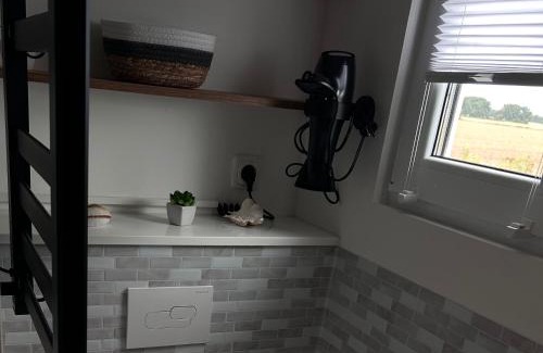 Arbshagen Appartement | Prima Resort Boddenblick - Camping-Stellplätze - Tiny Houses & Ferienwohnungen in Ostsee Nähe