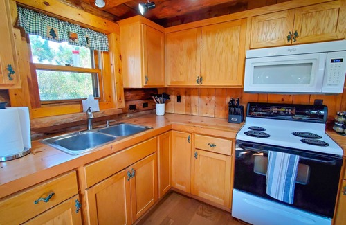 Long Lost Lake Cabine | Pristine Log Cabin on 600' of Lake Shore.