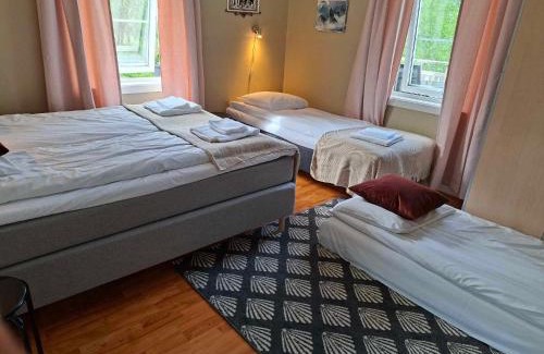 Narvik Appartement | Privat leilighet på gård med badstue og nordlys