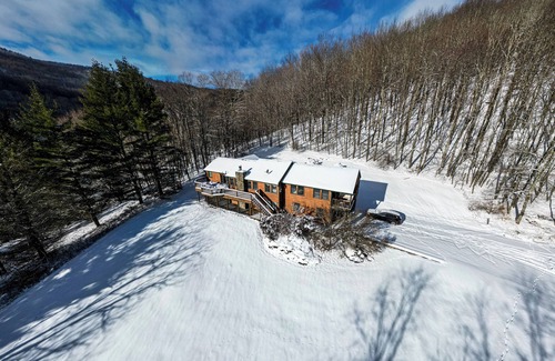 Snowshoe Cabine | Escapade familiale en raquettes confortable et relaxante!